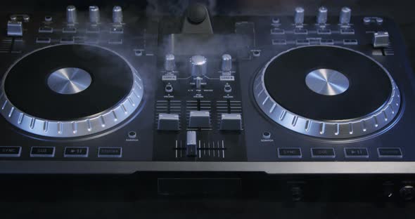 DJ Mixer And Spinning Turntable 35b