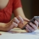 Woman&#39;s Hands Checks Accounts Using a Smartphone - VideoHive Item for Sale