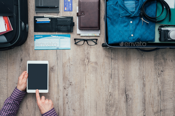 Traveling and booking online - Stock Photo - Images