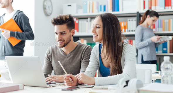 Friends studying together - Stock Photo - Images