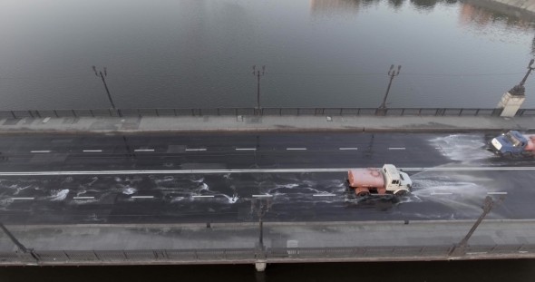 Donetsk City Watering Sweeping Machine Flight Over The Bridge
