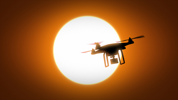 Quadcopter Drone On Background Of The Sun