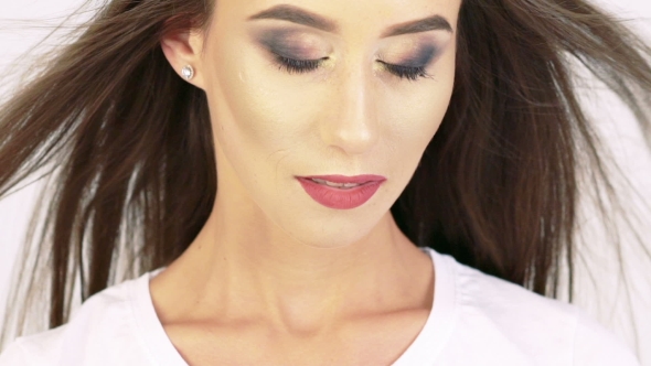 Beautiful Sexy Young Woman With Blowing Hair