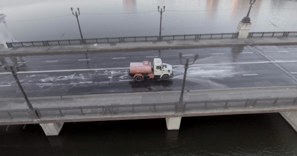 Donetsk City Watering Sweeping Machine Flight Over The Bridge