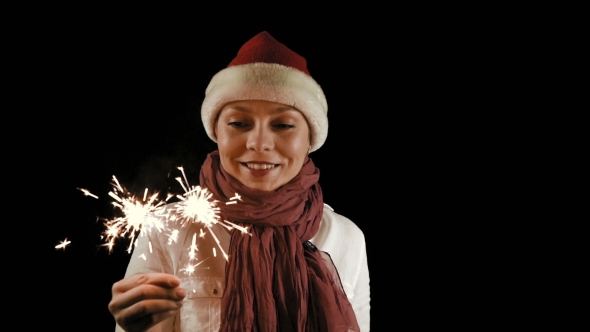 Pretty Girl In Red Christmas Santa With Sparklers
