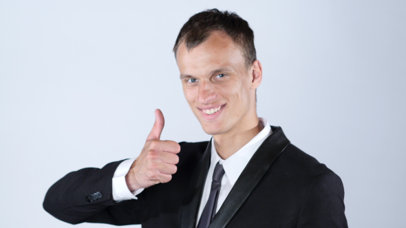 Best Job, Thumb Up by Young BUsinessman alt