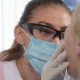 Female Dentist Wears Protective Glasses At The Dentist Cabinet - VideoHive Item for Sale
