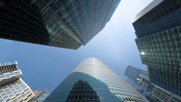 A Group Of Modern Skyscrapers In Buisness City, Rotating 