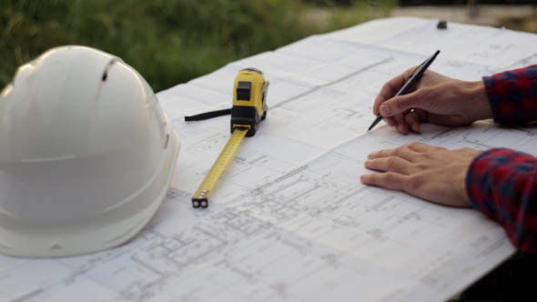 Engineer Designer Checks the Construction Drawings, Stock Footage ...