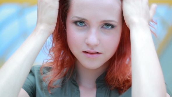 Girl Posing Touching Red Hair