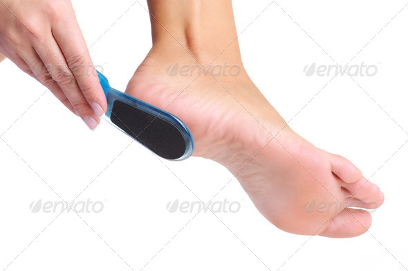 woman having her foot scrubbed