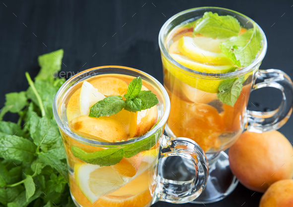 Fresh water with fruits and mint leaves