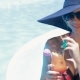 Woman Poses With Glass Of Coktail Near The Swimming Pool - VideoHive Item for Sale