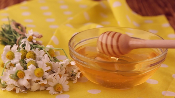 Extraction Honey With a Dipper, Honey Is a Source Of Health,