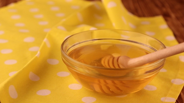 Extraction Honey With a Dipper, Honey Is a Source Of Health,