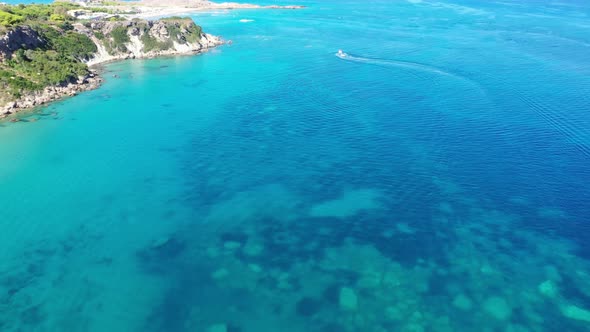 Aerial View of a Motor Boat Towing a Tube, Zakynthos, Greece