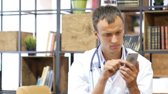 Doctor Using Smartphone in CLinic alt