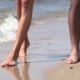  Of Feet Walking In Waters Edge On Beach - VideoHive Item for Sale