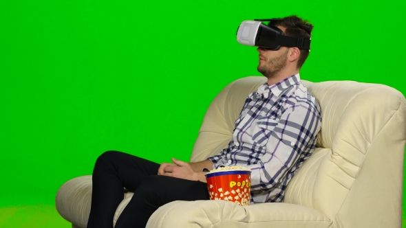 Guy In a Mask Augmented Reality Device. Green Screen alt