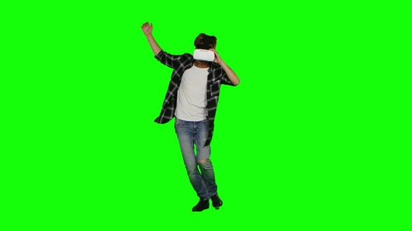 Male Wearing a Mask Of Virtual Reality On His Head. Green Screen, Stock ...