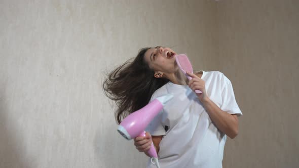 Female Drying Her Hair with Hairdrier Flying Hair alt