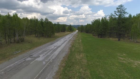Road in Siberian Forest alt