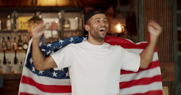 Fan Watching Football in a Bar alt
