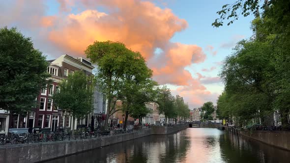 Sunset In Amsterdam From The Canal
