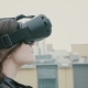 Brunette Woman Girl With Waving Hair Uses a Virtual Reality Glasses On The Roof.  - VideoHive Item for Sale