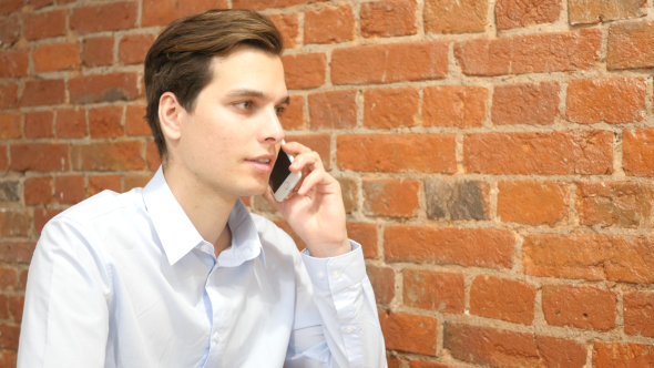 Phone Discussion in Office alt