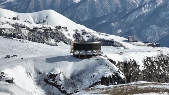 Gudauri, Georgia - February 22, 2022: Aerial view of Russia–Georgia Friendship Monument alt