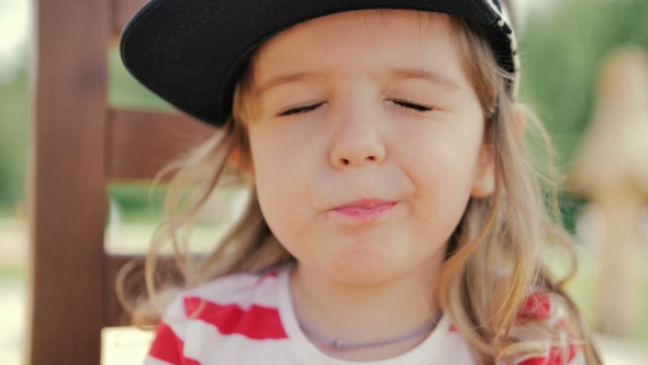 Girl With Pear Happily Eating Fruit