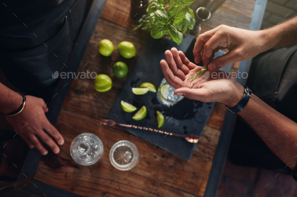 Experimenting with new recipe to make a cocktail drink - Stock Photo - Images