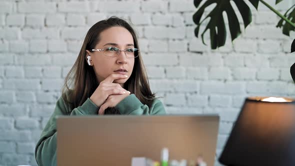 Serious White Girl Student Typing on Laptop Preparing Course Work alt