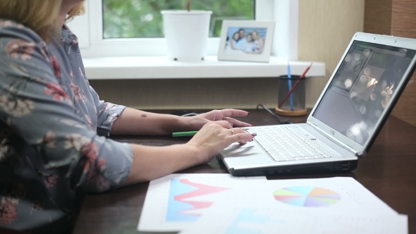 The Girl The Freelancer Is Working On The Computer At Home