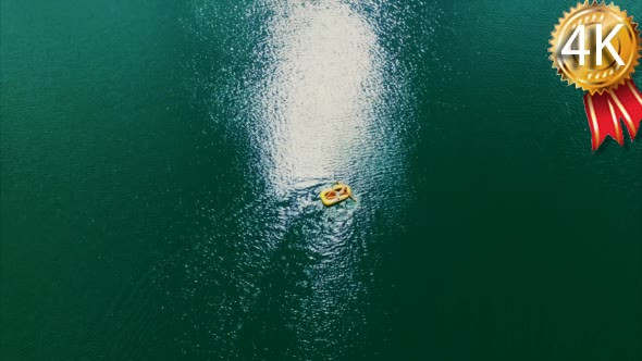 a Sailing Boat on the Blue Lake