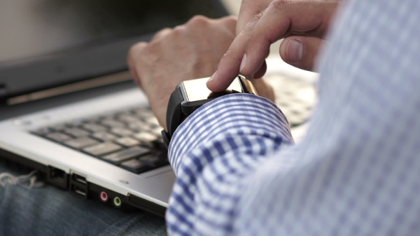 Businessman Watching Time On a Smart Watch