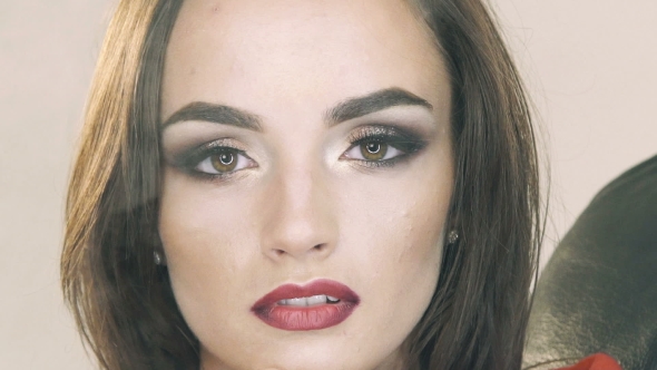 Very Beautiful Brunette On a White Background alt