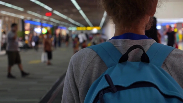 Girl With Bag At The Airport Goes On a Journey