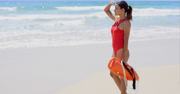 Side View On Woman In Red With Buoy alt