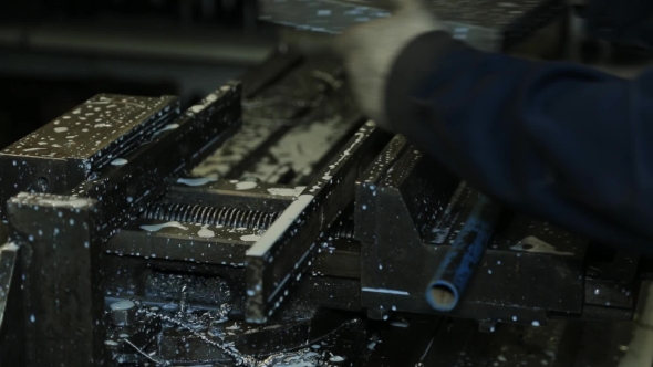 From Machine For Drilling Remove Workpiece And Put New.