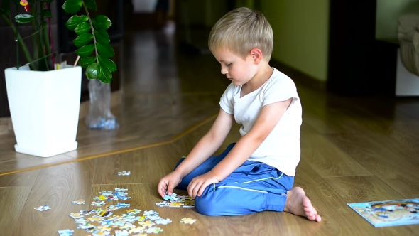 Boy Playing At Home