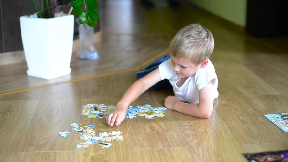 Boy Playing At Home