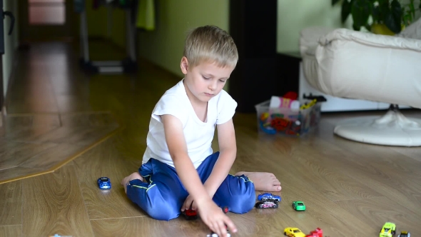 Boy Playing At Home