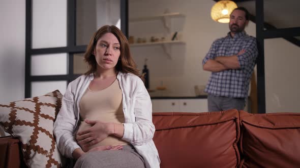 Upset Pregnant Woman After Quarrel with Husband alt