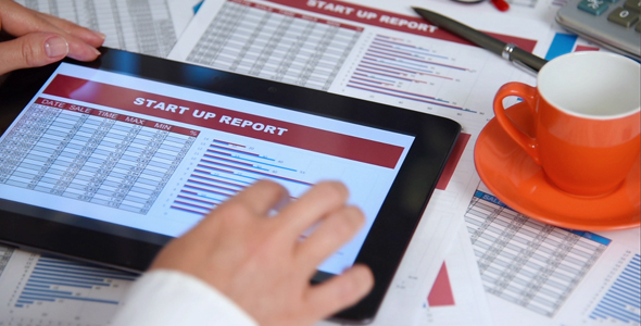 Stock Exchange Statistics On Tablet alt