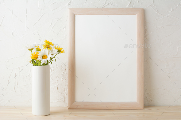 Frame mockup with white and yellow chamomiles in vase - Stock Photo - Images