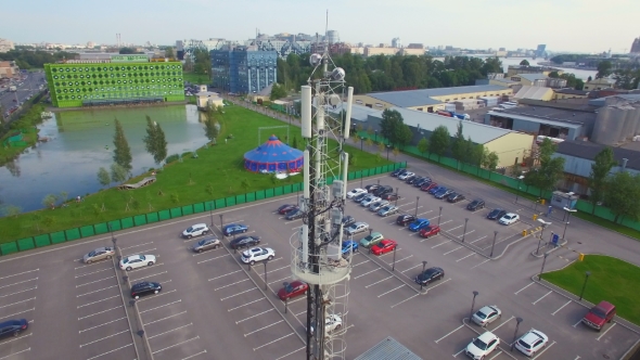 Aerial view of a telecommunications cell tower in the city