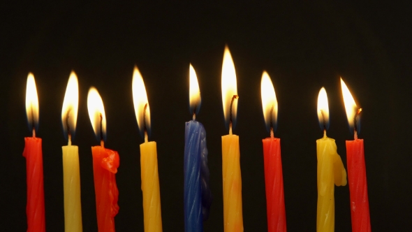 Chanukah Candles All In A Row. Bright, Shiny Multicolor Candles For The ...