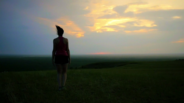 Athlete Warming Up On The Sunset Background alt